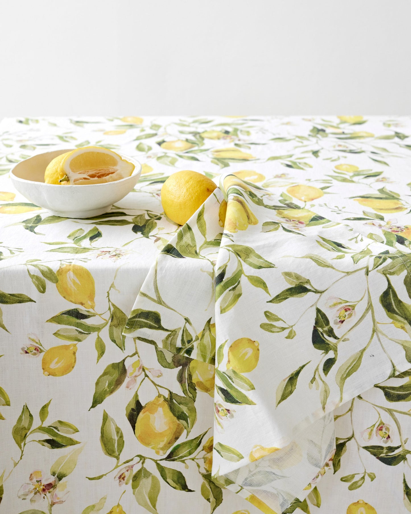 Citrus garden print on white linen tablecloth | MagicLinen