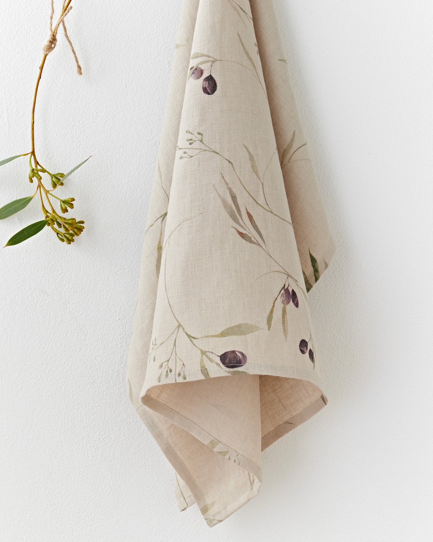 Linen tea towel in Olive orchard print on natural | MagicLinen