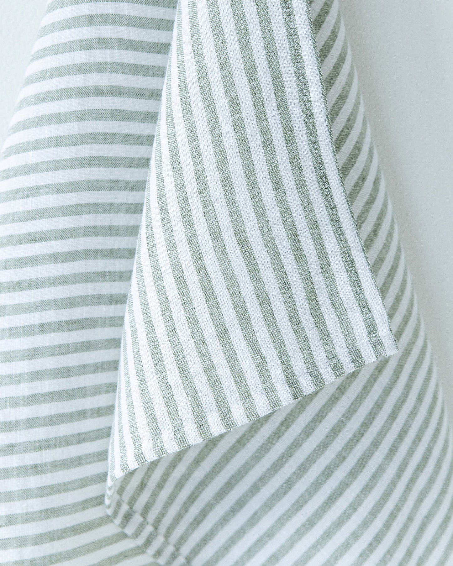 Linen tea towel in Striped in Forest Green | MagicLinen