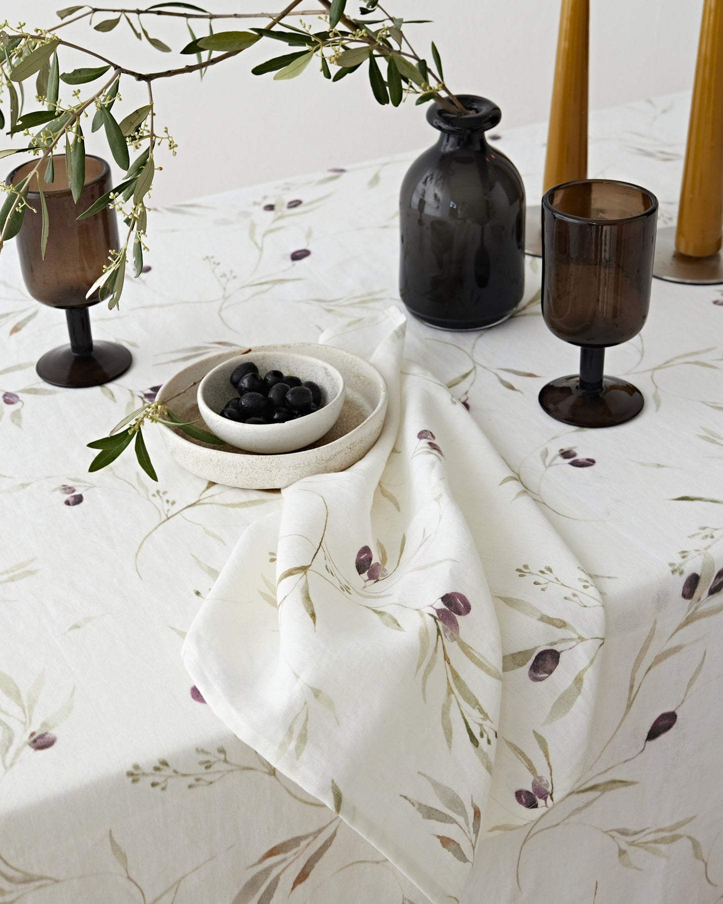 Olive orchard print on white linen tablecloth | MagicLinen