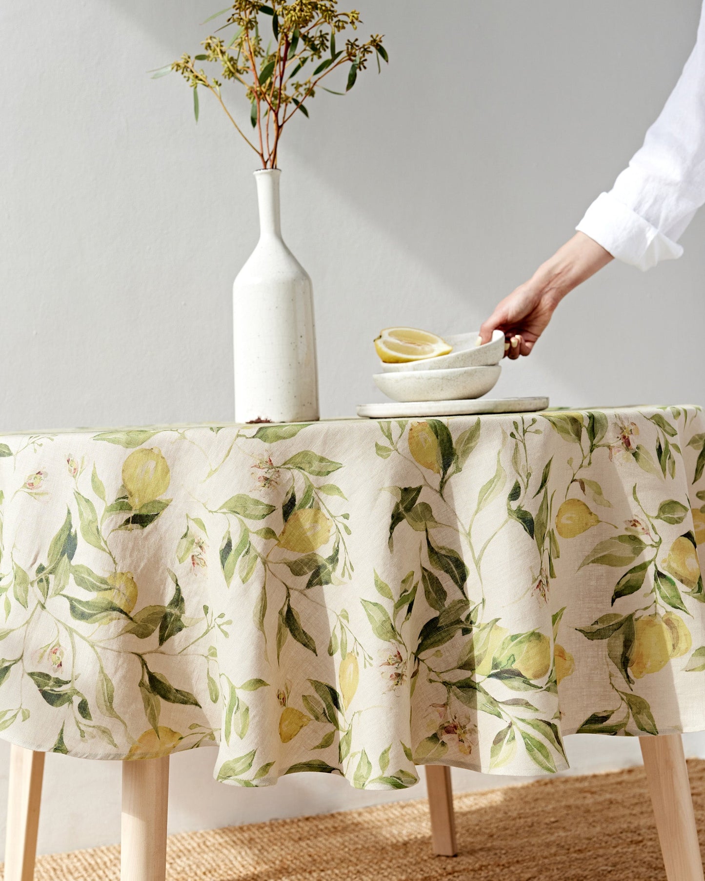 Round linen tablecloth in Citrus garden print on natural | MagicLinen