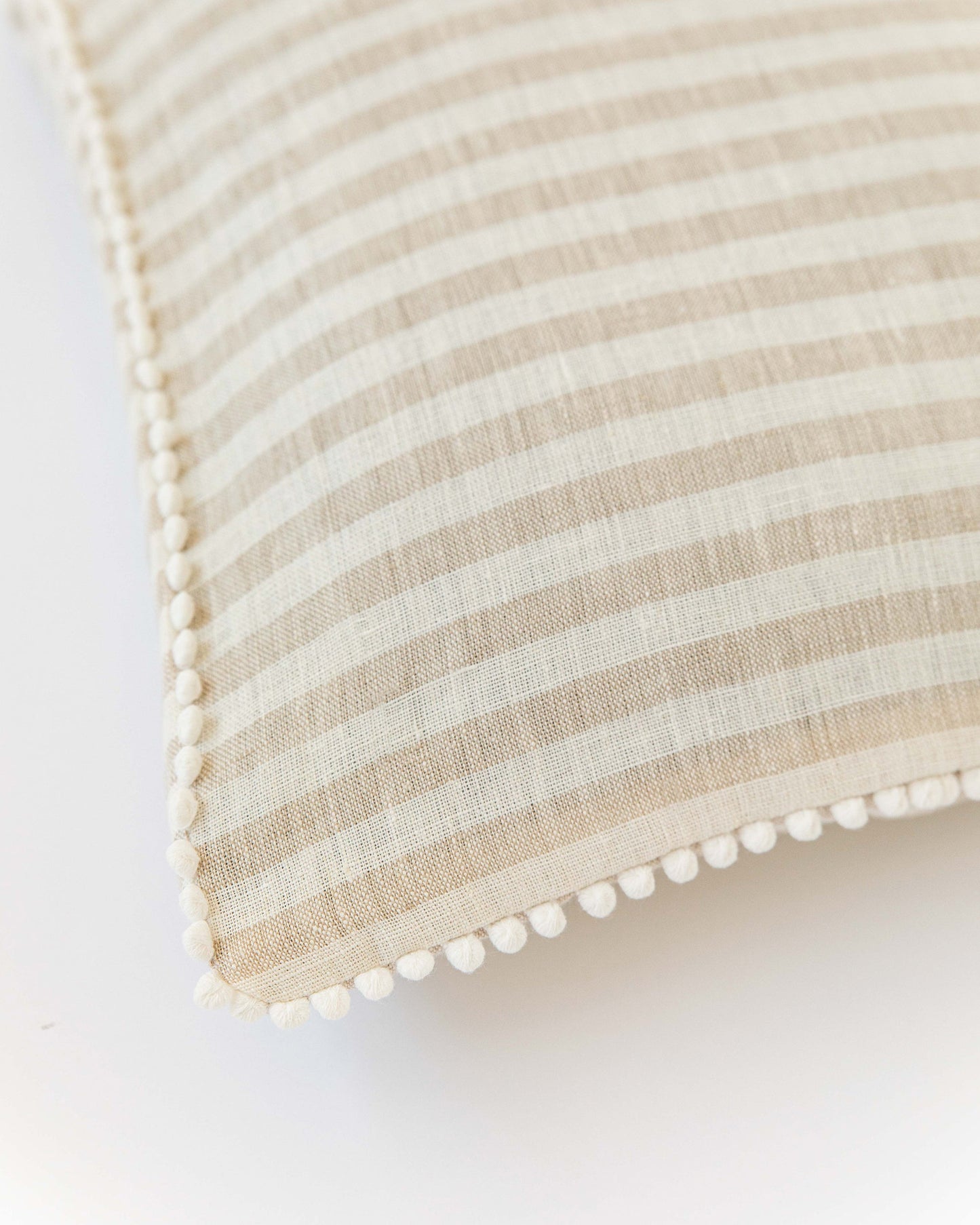 Pom pom trim linen pillowcase in Striped in natural - MagicLinen
