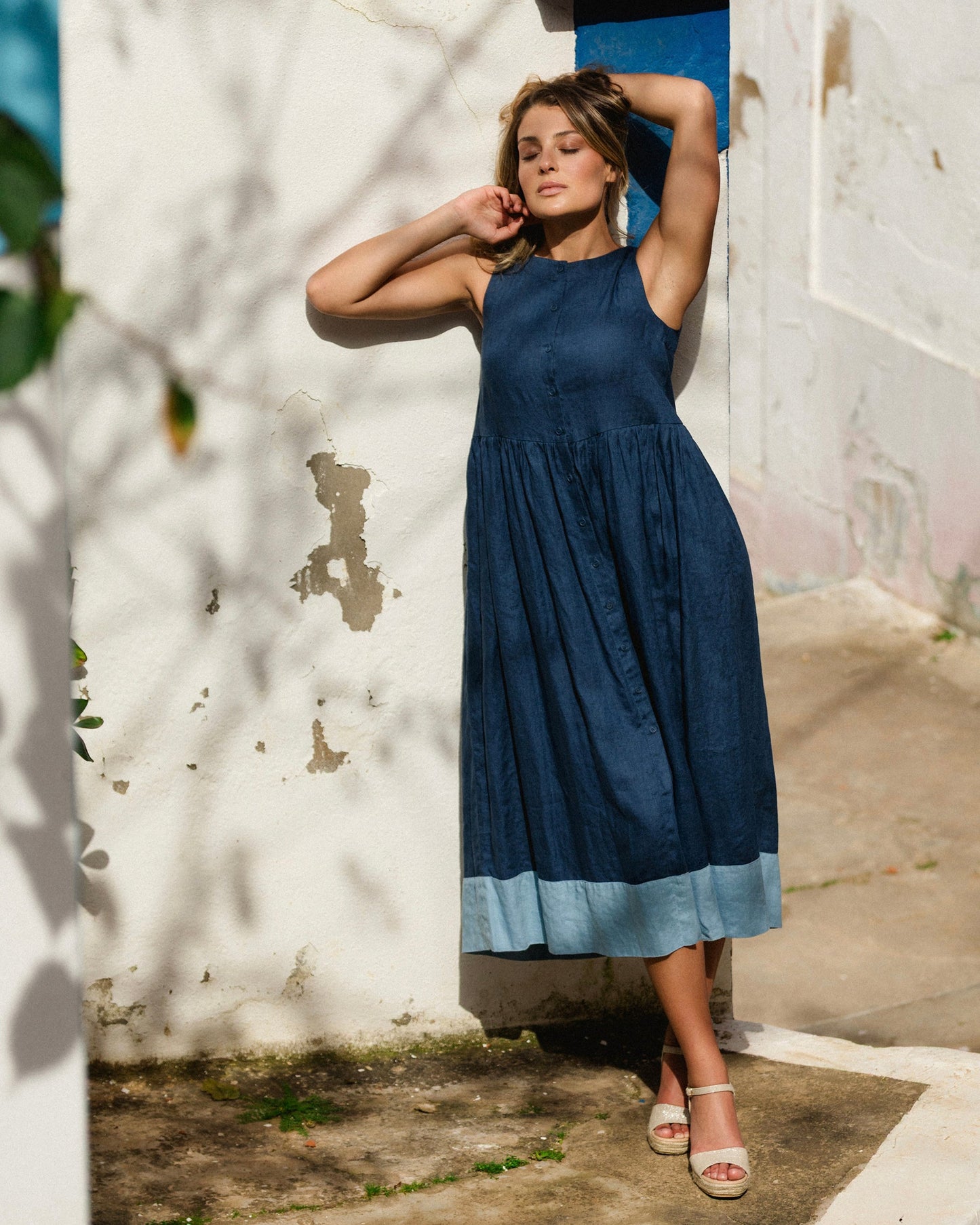 MagicLinen Deep Navy Blue OSLO relaxed sleeveless midi linen dress with full corozo button front  