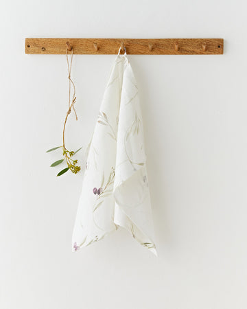 Linen tea towel in Olive orchard print on white | MagicLinen