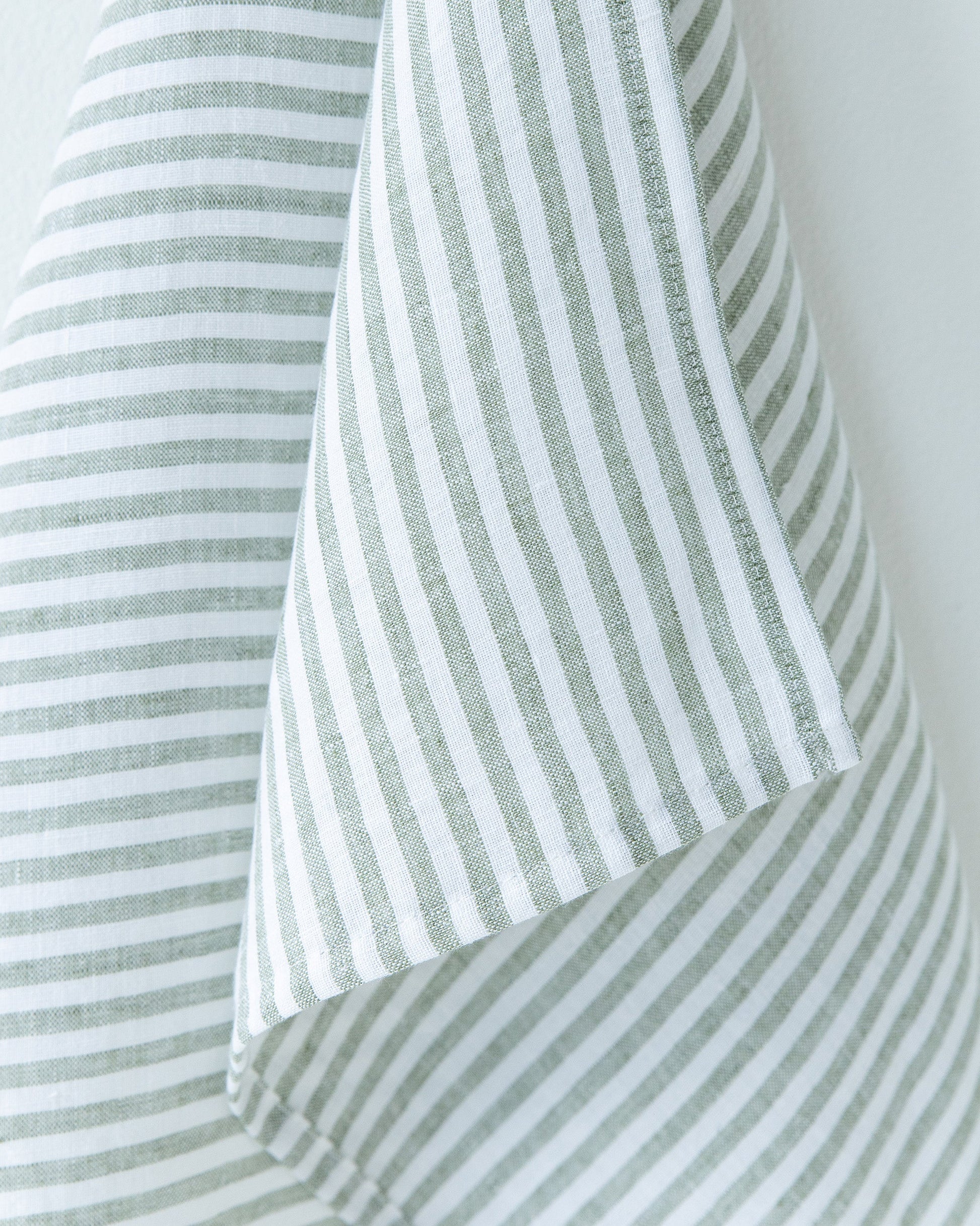 Linen tea towel in Striped in Forest Green | MagicLinen