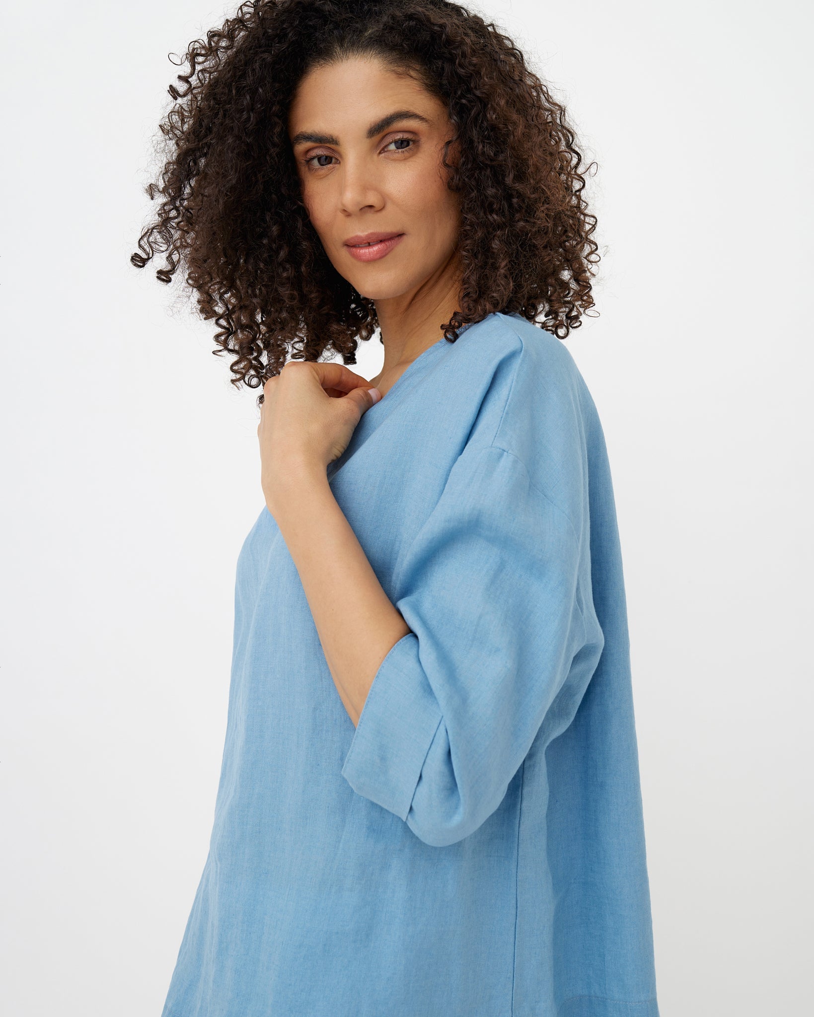 MagicLinen soft blue linen top with boat neckline and mid-length sleeves  