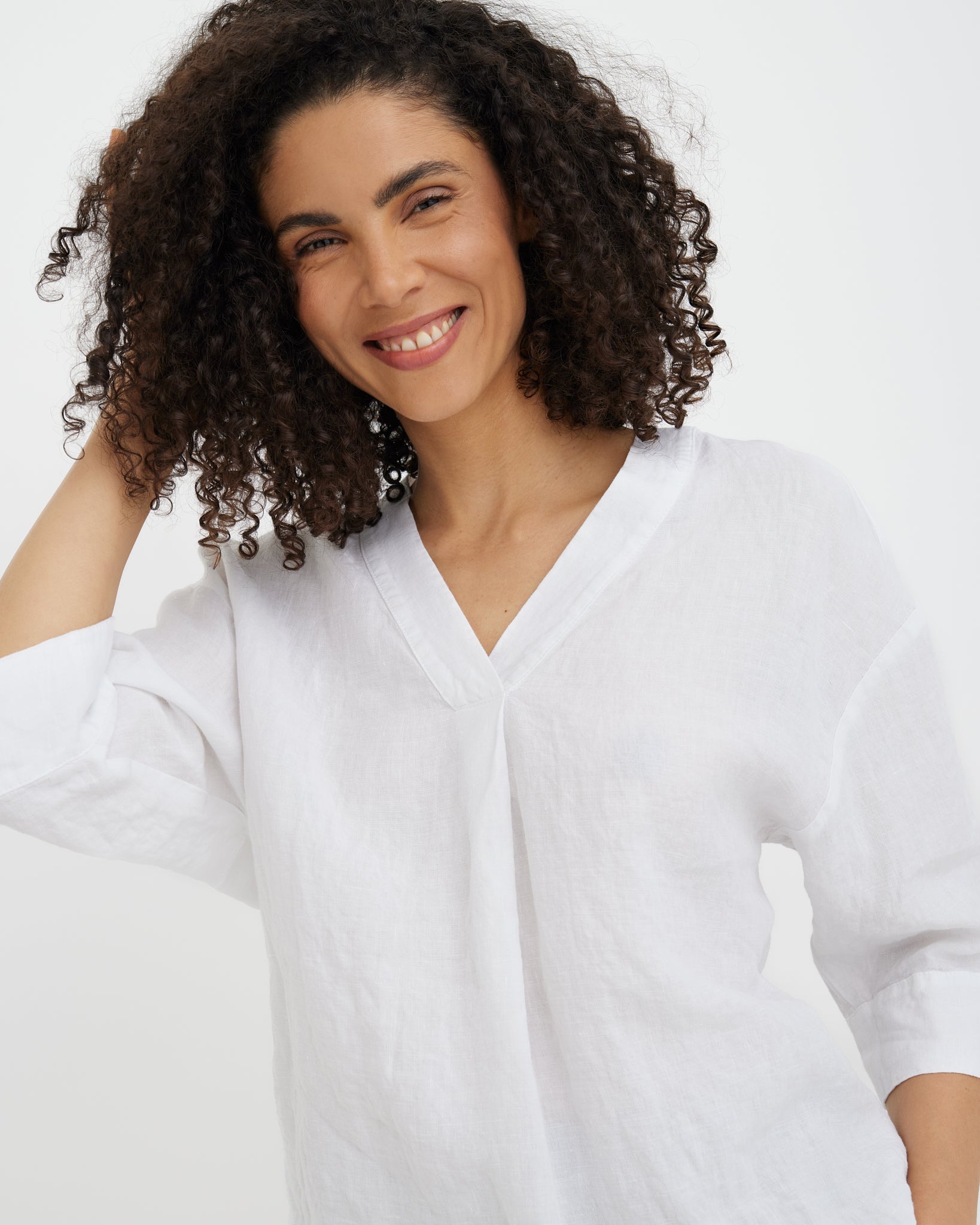 MagicLinen White linen top with split V-neck and mid-length sleeves