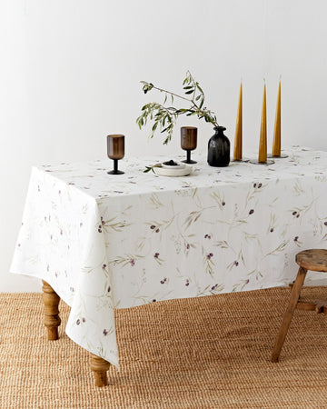 Olive orchard print on white linen tablecloth | MagicLinen