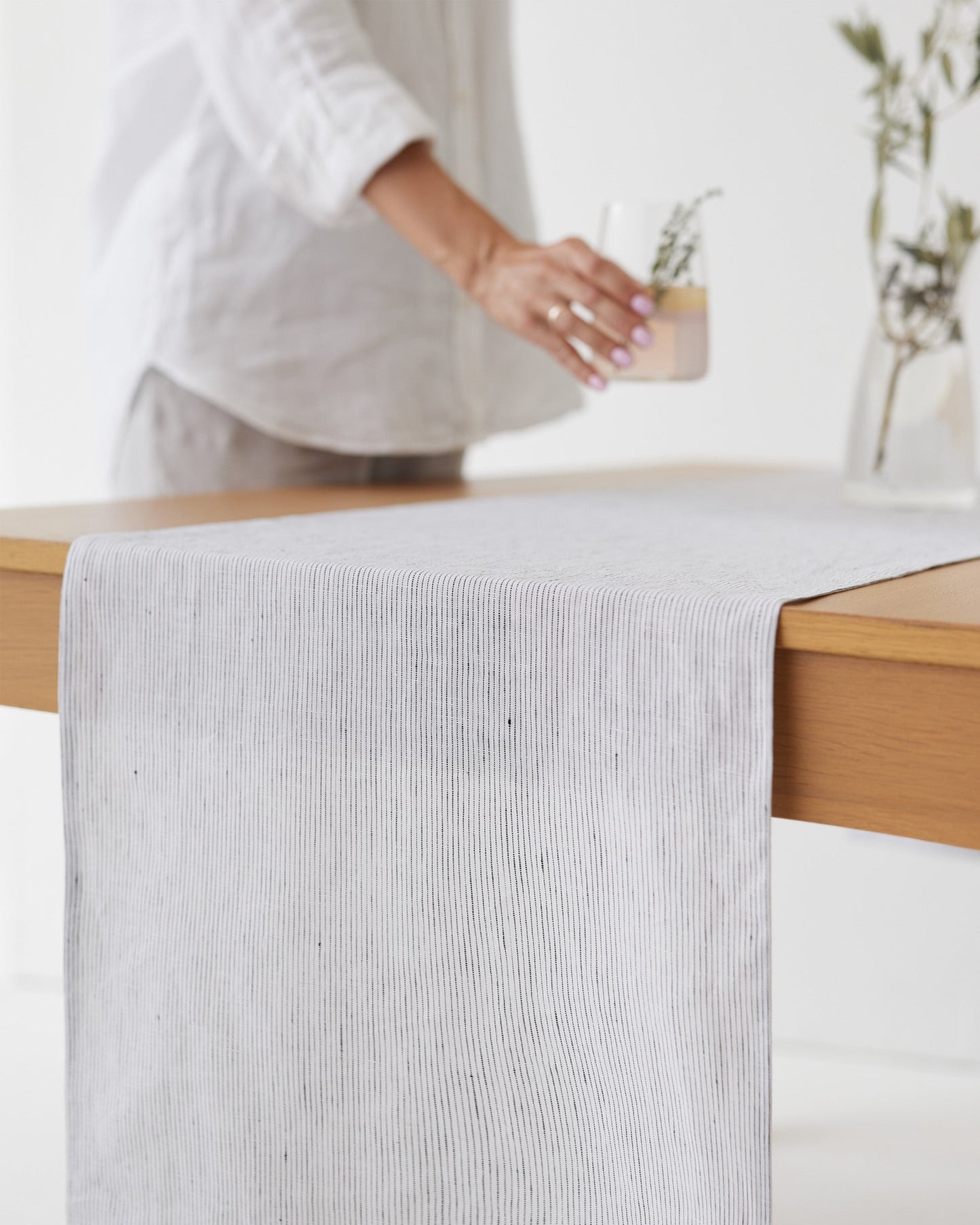 Linen table runner in Pinstripe black