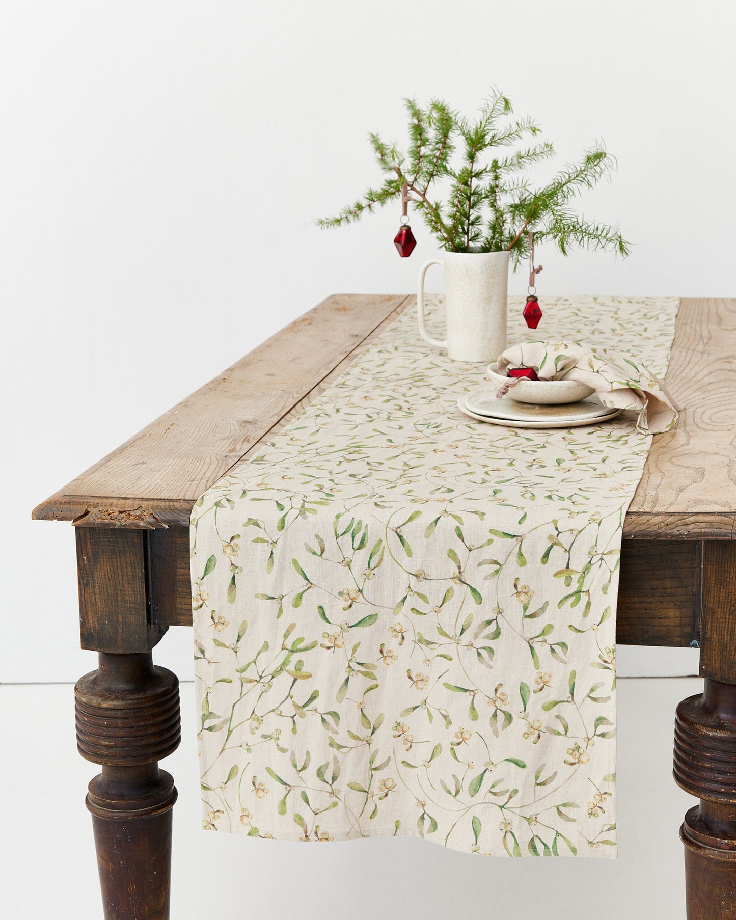 Linen Table Runner in Under the mistletoe print | MagicLinen