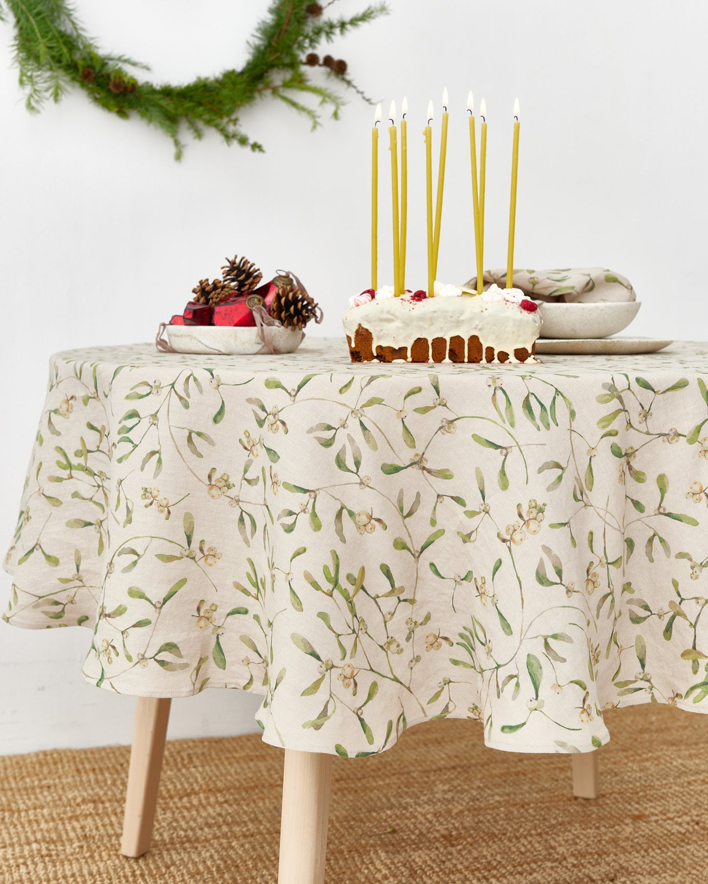 Round Linen Tablecloth in Under the mistletoe print | MagicLinen