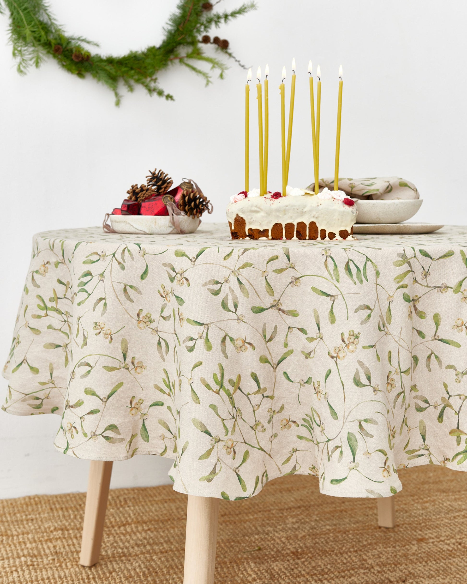Round Linen Tablecloth in Under the mistletoe print | MagicLinen