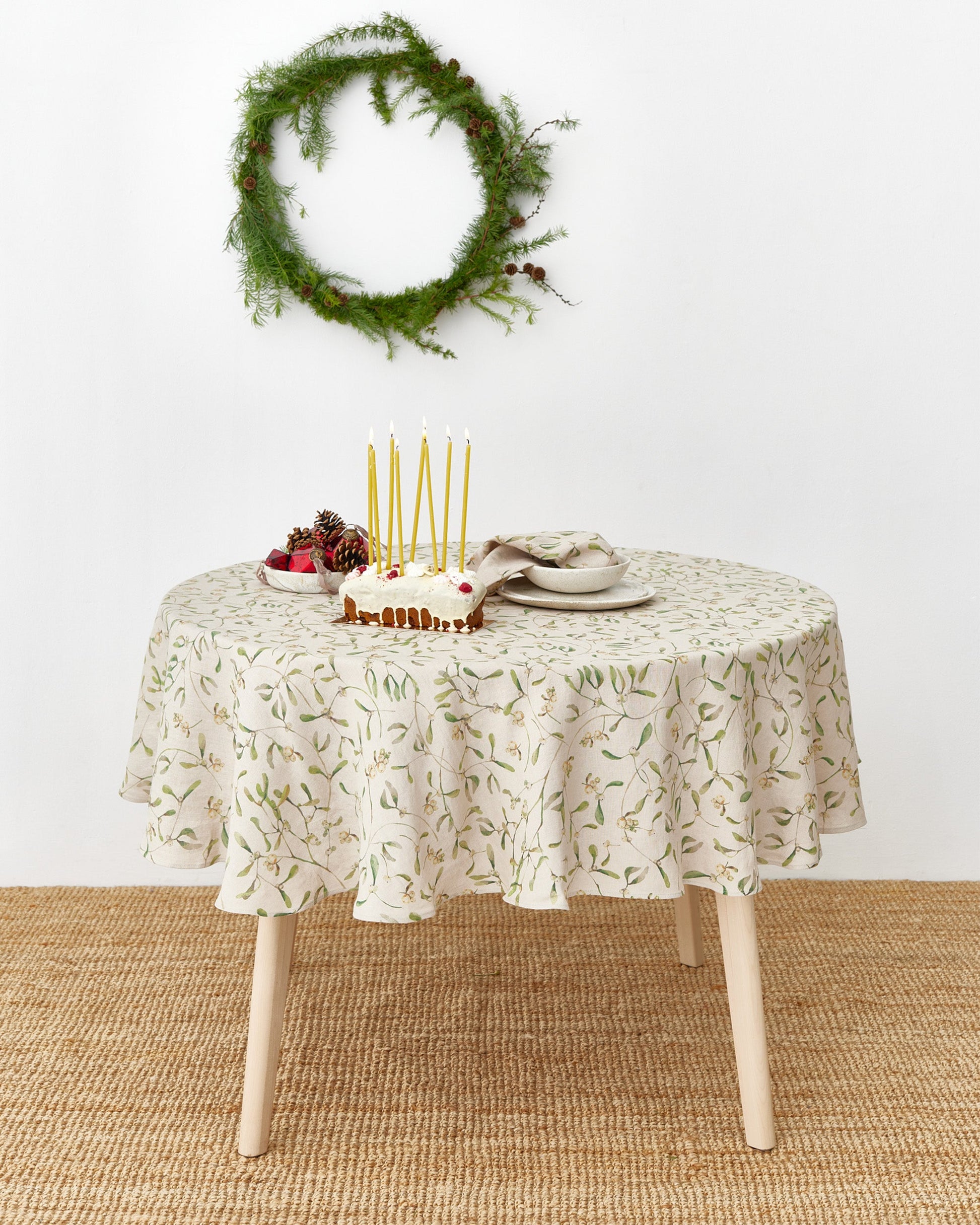 Round Linen Tablecloth in Under the mistletoe print | MagicLinen