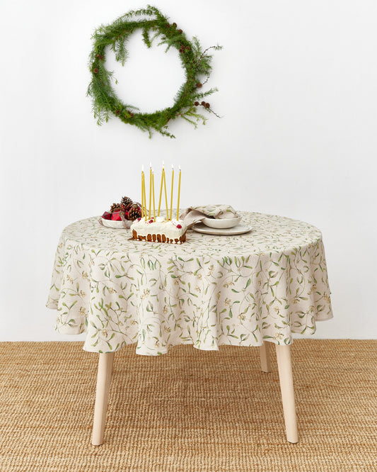 Round Linen Tablecloth in Under the mistletoe print | MagicLinen